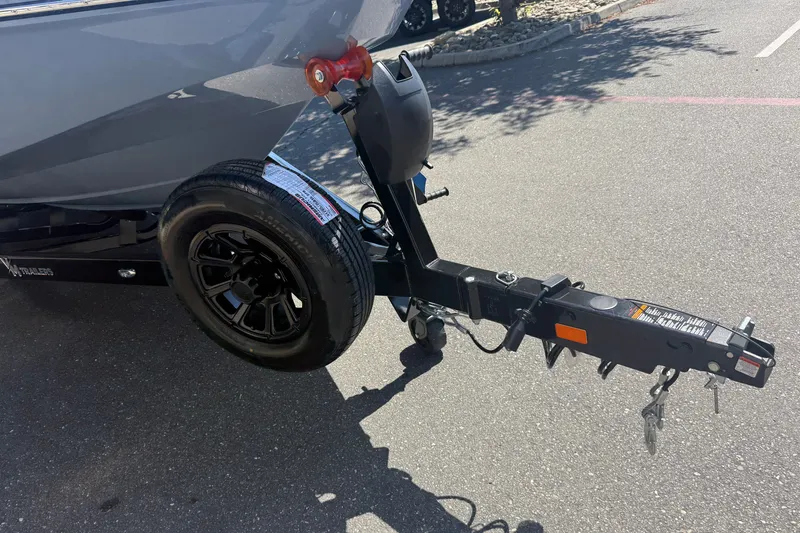 Slide: The Image of Trailer hitch of 2026 MB B52 23 Alpha boat on asphalt surface. - 9