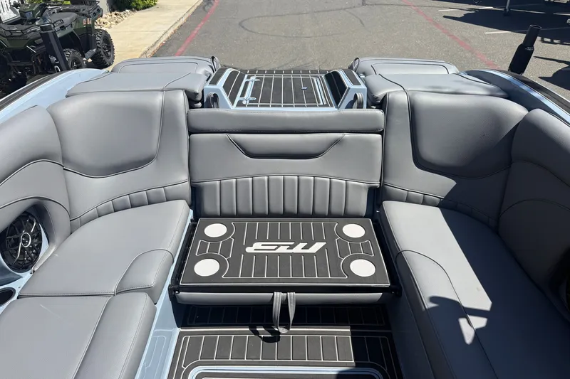 Slide: The Image of Luxurious interior of 2026 MB B52 23 Alpha boat with sleek gray seating. - 20