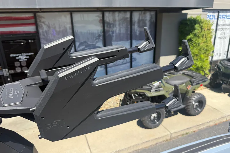 Slide: The Image of Close-up of MB B52 23 Alpha 2026 vehicle accessory with PTM branding, outdoors. - 30