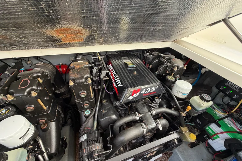 Slide: The Image of Engine compartment of a 2001 Sea Ray Sundancer 280 with Mercury 4.3L engine. - 24