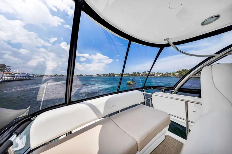 Slide: The Image of Interior view of 2010 Sea Ray 52 Sedan Bridge yacht with ocean backdrop. - 75