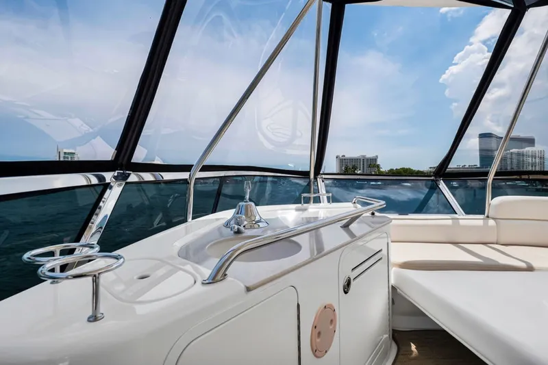 Slide: The Image of Luxurious interior of 2010 Sea Ray 52 Sedan Bridge yacht with panoramic views. - 76