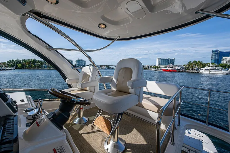 Slide: The Image of Luxurious 2010 Sea Ray 520 Sedan Bridge yacht interior with waterfront view. - 20