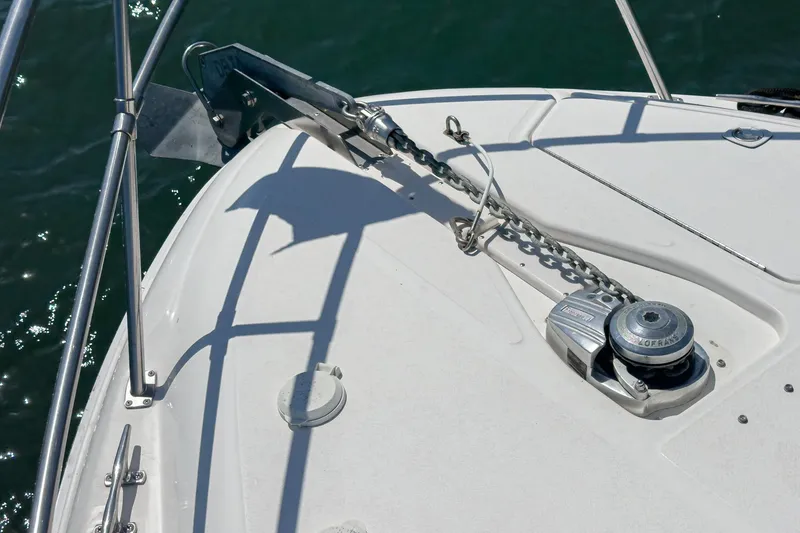 Slide: The Image of The bow of a 1999 Sea Ray 370 Aft Cabin with anchor and windlass. - 17