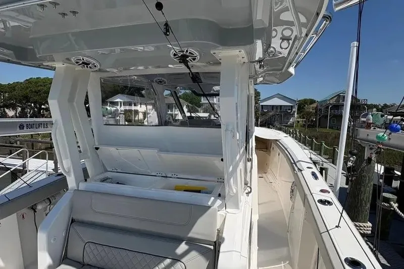 Slide: The Image of 2025 Pursuit S 328 Sport boat interior with seating and modern design. - 27