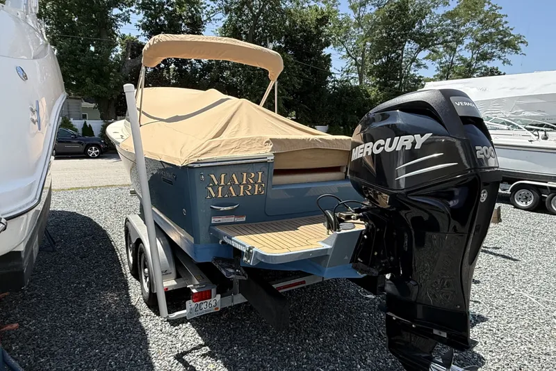 Slide: The Image of 2018 Vanquish Bristol Harbor 23 boat with Mercury 200 engine, covered and on trailer. - 11
