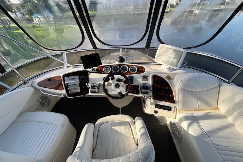 Slide: The Image of Luxurious helm of 2004 Meridian 459 Motoryacht with Garmin navigation system. - 25
