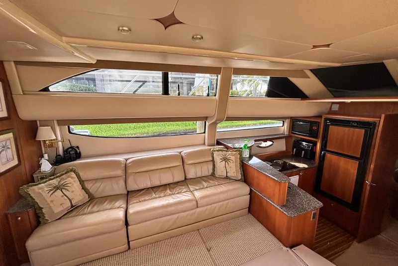 Slide: The Image of Luxurious interior of 2004 Meridian 459 Motoryacht with leather seating and modern amenities. - 19