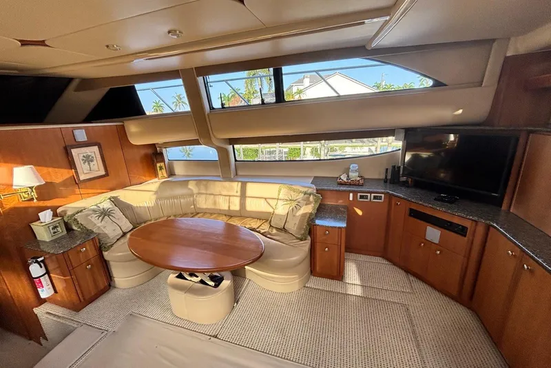 Slide: The Image of Luxurious interior of 2004 Meridian 459 Motoryacht with plush seating and elegant decor. - 18
