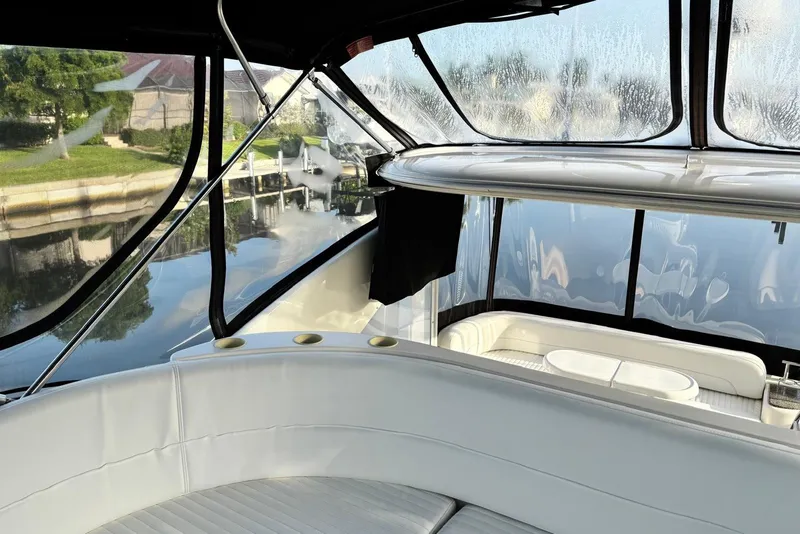 Slide: The Image of Interior view of 2004 Meridian 459 Motoryacht with sleek seating and clear windows. - 1
