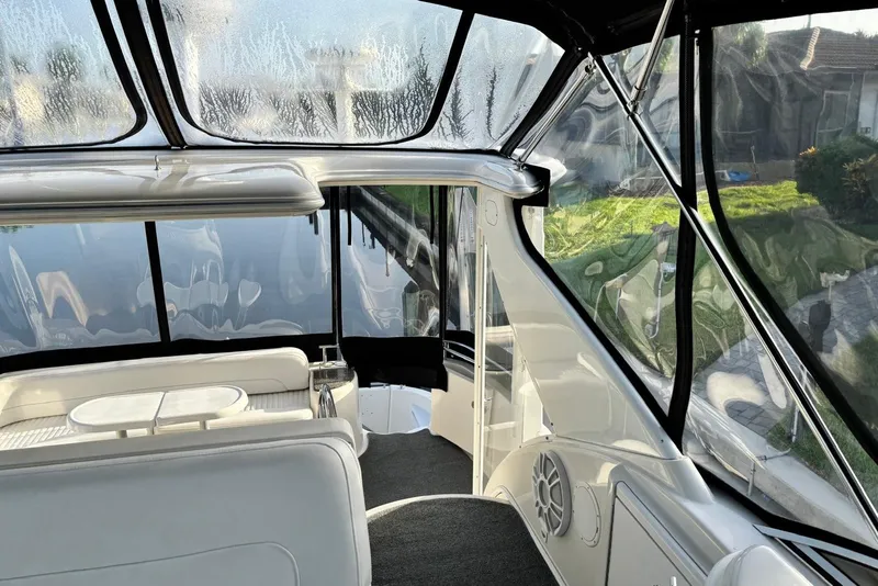Slide: The Image of Interior view of 2004 Meridian 459 Motoryacht with sleek seating and clear windows. - 3