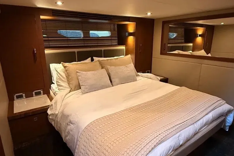 Slide: The Image of Luxurious bedroom interior of 2016 Sea Ray Sundancer 510 yacht with cozy bedding. - 22