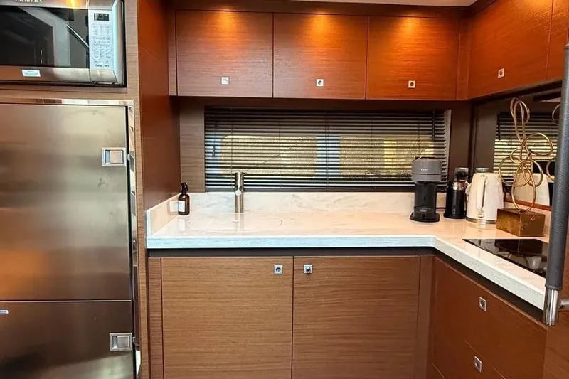 Slide: The Image of Luxurious kitchen interior of 2016 Sea Ray Sundancer 510 yacht with modern appliances. - 13