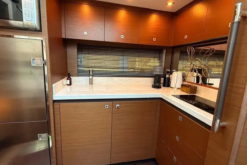 Slide: The Image of Luxurious kitchen interior of 2016 Sea Ray Sundancer 510 yacht with modern appliances. - 19