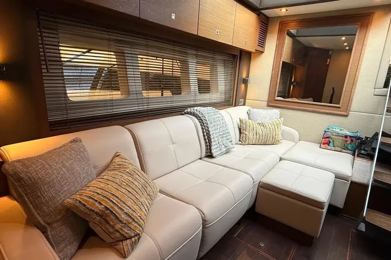Slide: The Image of Luxurious interior of 2016 Sea Ray Sundancer 510 yacht with plush seating and elegant decor. - 20