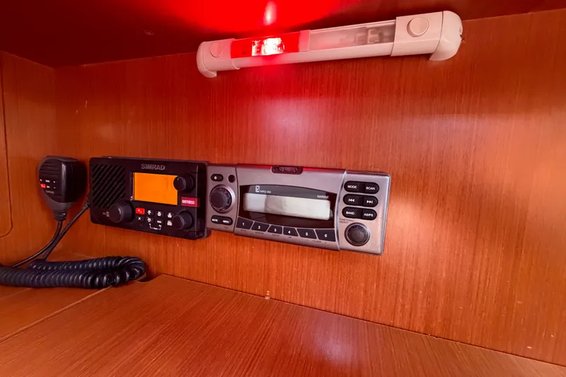 Slide: The Image of Beneteau Oceanis 370 (2013) interior with Simrad radio and control panel. - 25