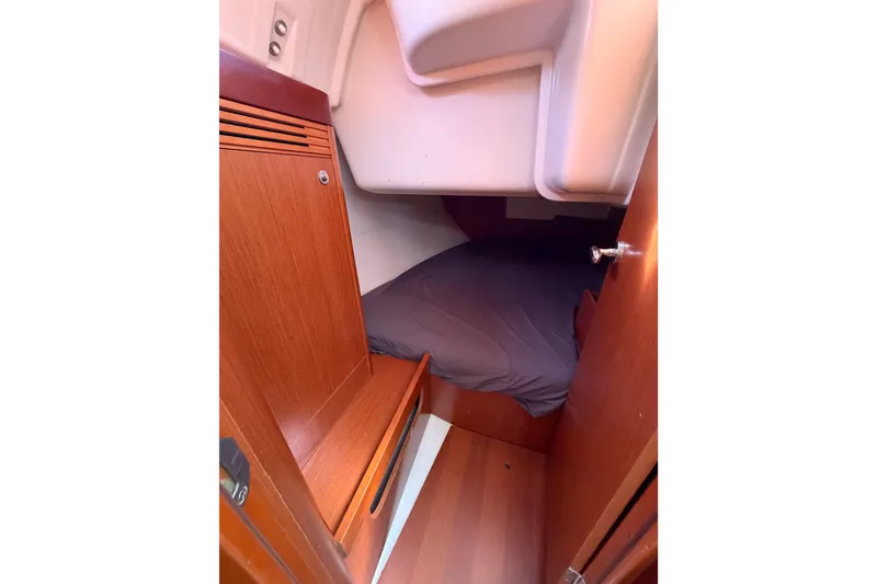 Slide: The Image of Cozy cabin interior of 2013 Beneteau Oceanis 370 sailboat with wooden finish. - 17