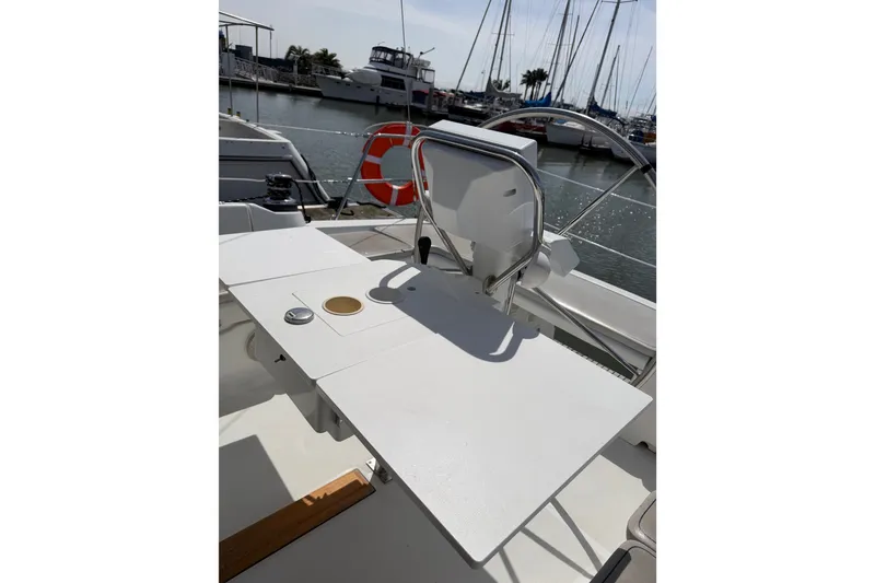 Slide: The Image of Cockpit view of 2013 Beneteau Oceanis 370 sailboat docked at marina. - 8