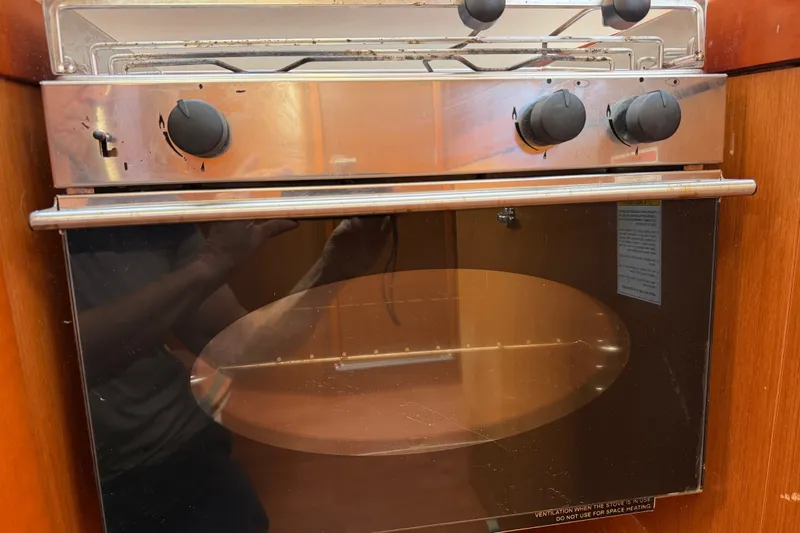 Slide: The Image of Stainless steel oven in 2013 Beneteau Oceanis 370 yacht kitchen. - 30