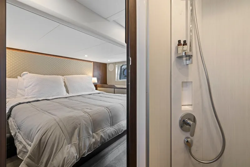 Slide: The Image of Luxurious bedroom and shower in 2025 Fairline Squadron 50 yacht. - 33