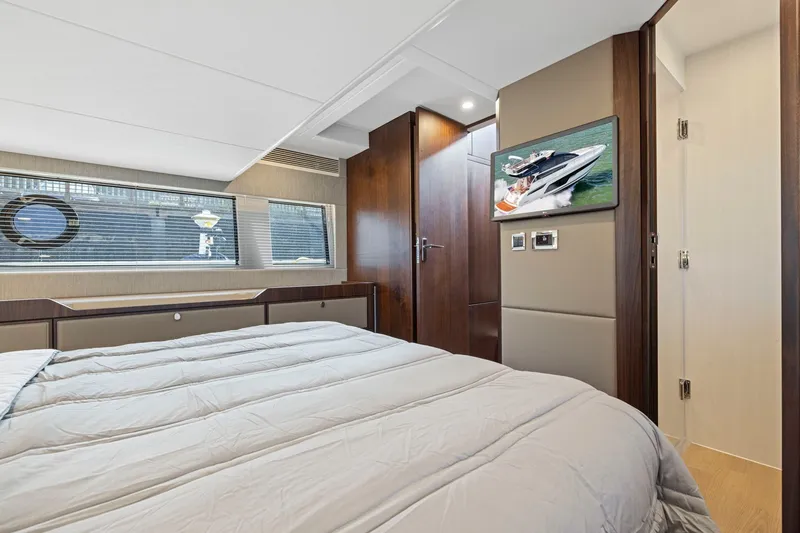 Slide: The Image of Luxurious bedroom interior of 2025 Fairline Squadron 50 yacht with modern decor. - 32