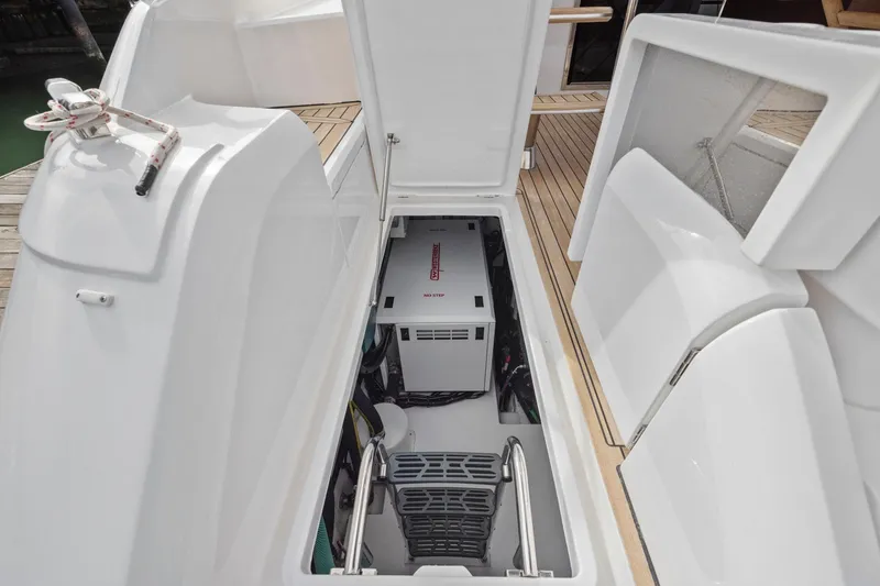 Slide: The Image of Engine compartment of 2025 Fairline Squadron 50 yacht, showcasing modern design and equipment. - 101