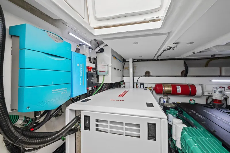 Slide: The Image of Engine room of 2025 Fairline Squadron 50 yacht, featuring modern equipment and systems. - 106