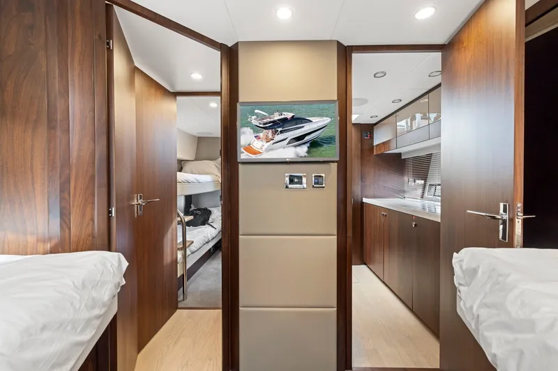 Slide: The Image of Luxurious interior of 2025 Fairline Squadron 50 yacht with modern wood finishes. - 70