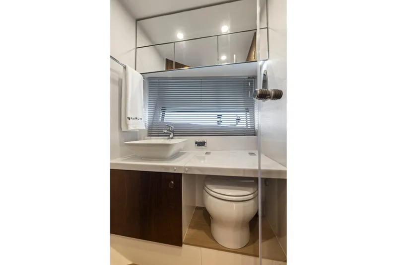 Slide: The Image of Modern bathroom interior on 2025 Fairline Squadron 50 yacht, featuring sleek design and fixtures. - 28