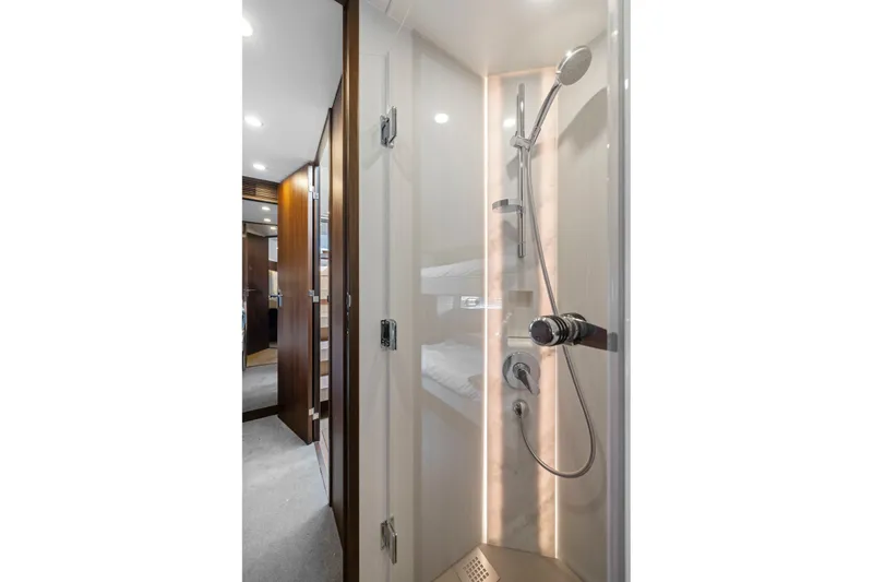 Slide: The Image of Luxurious shower in 2025 Fairline Squadron 50 yacht, featuring modern fixtures and elegant design. - 26