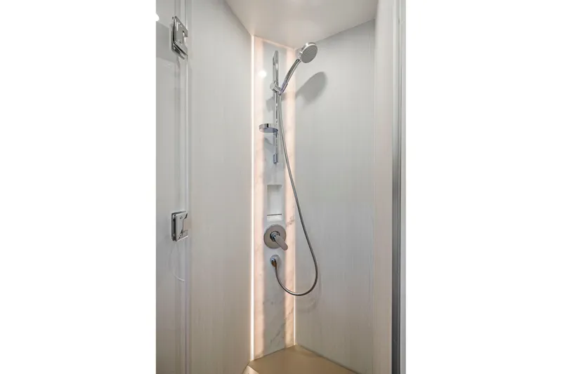 Slide: The Image of Shower area in 2025 Fairline Squadron 50 yacht, featuring modern fixtures and sleek design. - 27