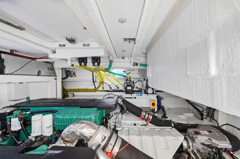 Slide: The Image of Engine room of 2025 Fairline Squadron 50 yacht, showcasing modern machinery and components. - 103