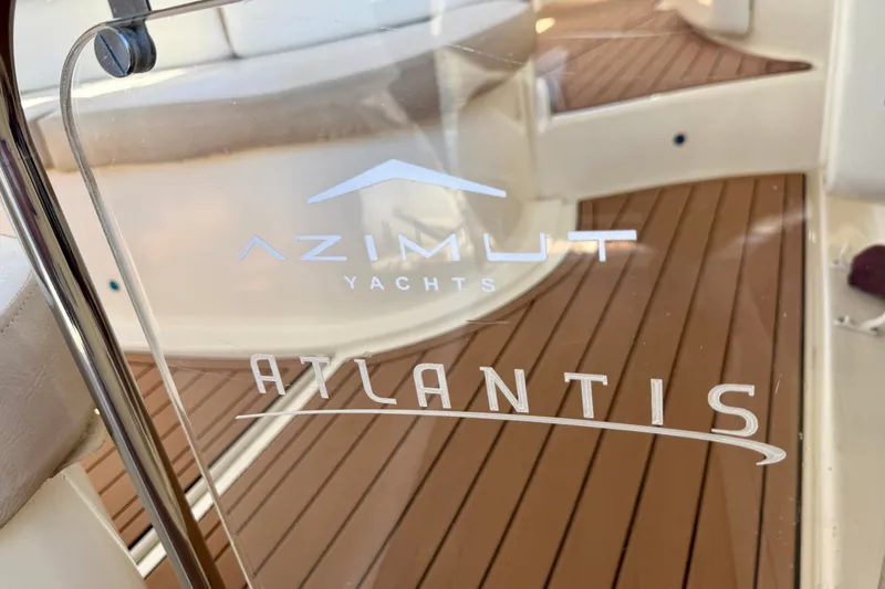 Slide: The Image of Azimut Atlantis 47 yacht interior, showcasing elegant wooden flooring, 2006 model. - 14