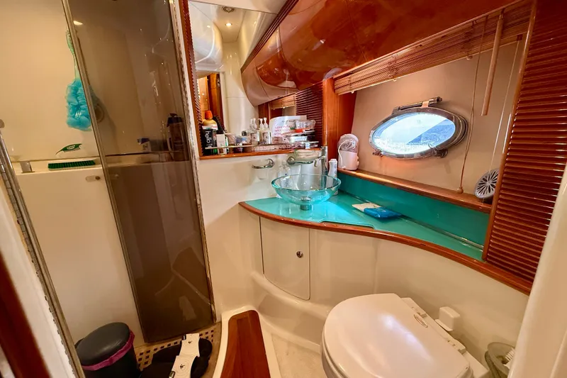 Slide: The Image of Luxurious bathroom interior of 2006 Azimut Atlantis 47 yacht with modern amenities. - 30