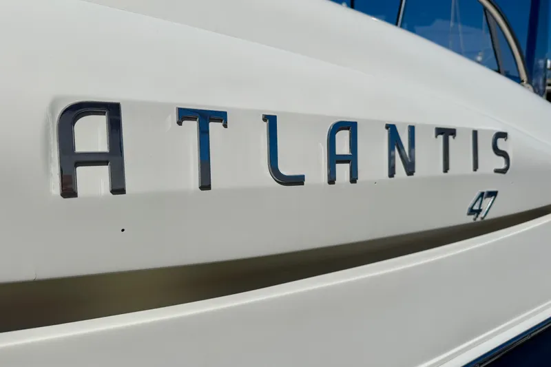 Slide: The Image of Close-up of 2006 Azimut Atlantis 47 yacht nameplate on white hull. - 5