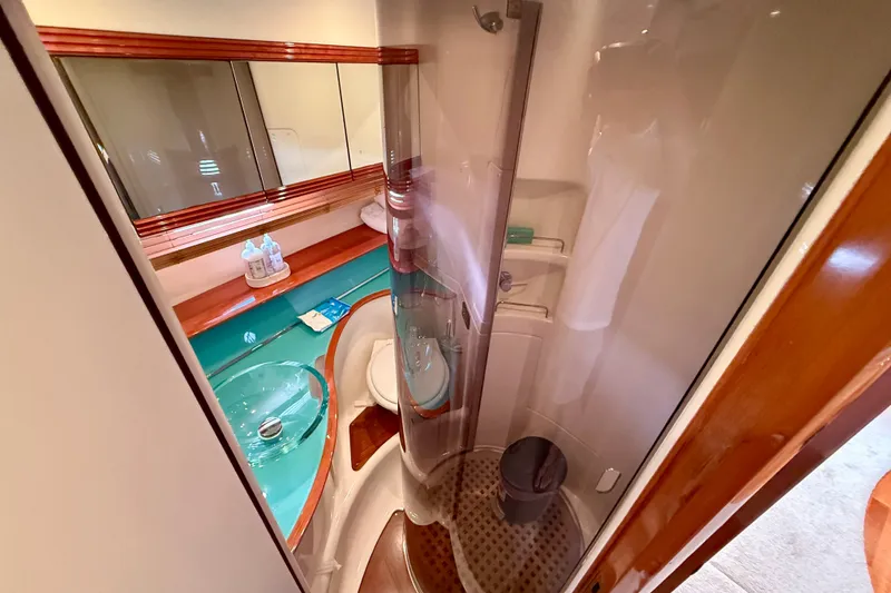 Slide: The Image of Luxurious bathroom in 2006 Azimut Atlantis 47 yacht with modern fixtures and elegant design. - 27