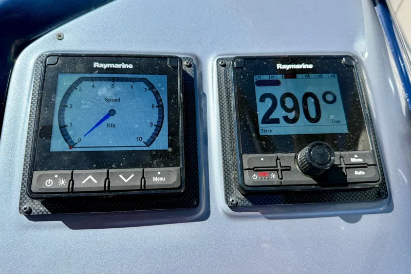 Slide: The Image of Raymarine navigation displays on 2006 Azimut Atlantis 47 yacht dashboard. - 17