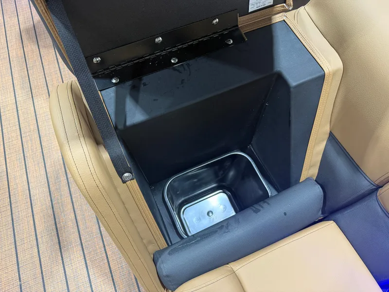 Slide: The Image of An open storage compartment with a metal bin in a Bentley Pontoons Legacy 220 Swingback. - 28