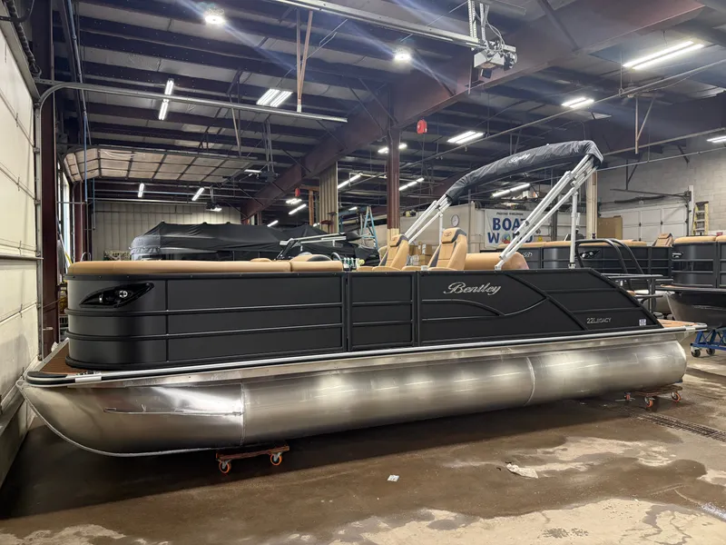Slide: The Image of A 2027 Bentley Pontoons Legacy 220 Swingback with Honda 4-Stroke EFI is in a warehouse. - 37