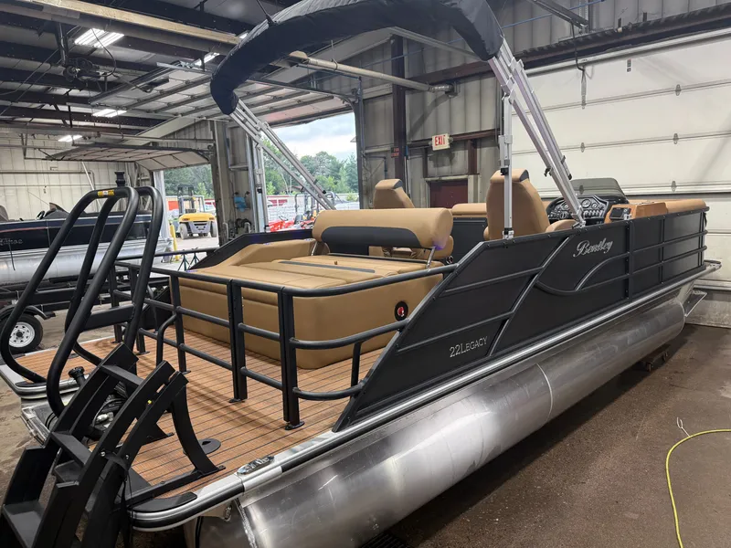 Slide: The Image of A Bentley Pontoons Legacy 220 Swingback with Honda 4-Stroke EFI, parked indoors. - 45