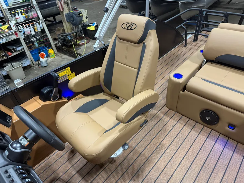 Slide: The Image of Luxurious captain's chair in a Bentley pontoon boat with sleek armrests and modern design. - 11