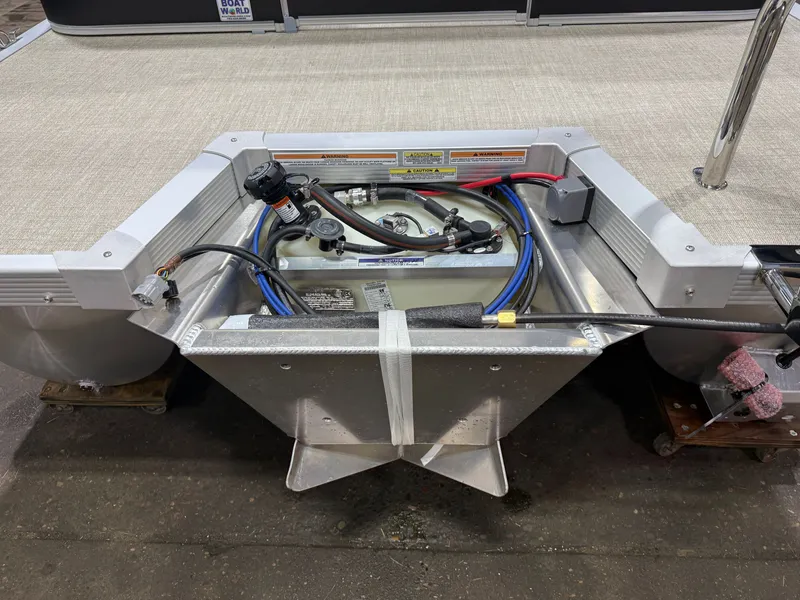 Slide: The Image of The image shows the engine area of a Tahoe Sport 2380 Quad Lounge with a Honda 4-Stroke EFI engine. - 37