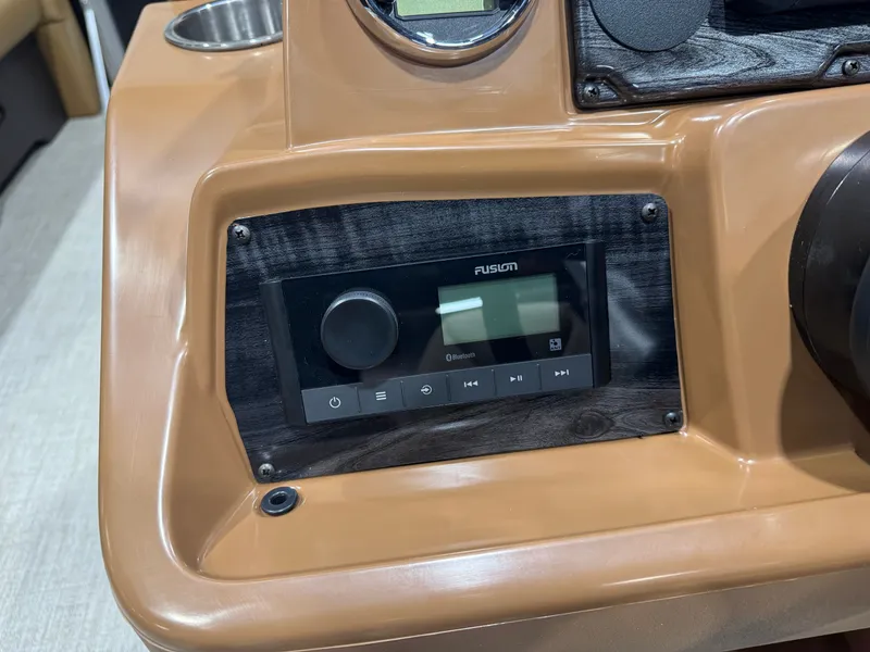 Slide: The Image of The image shows a modern dashboard featuring a Fusion audio system. - 14