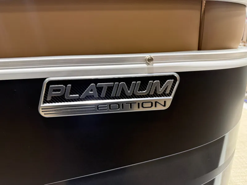 Slide: The Image of Close-up of the "Platinum Edition" emblem on a boat. - 34
