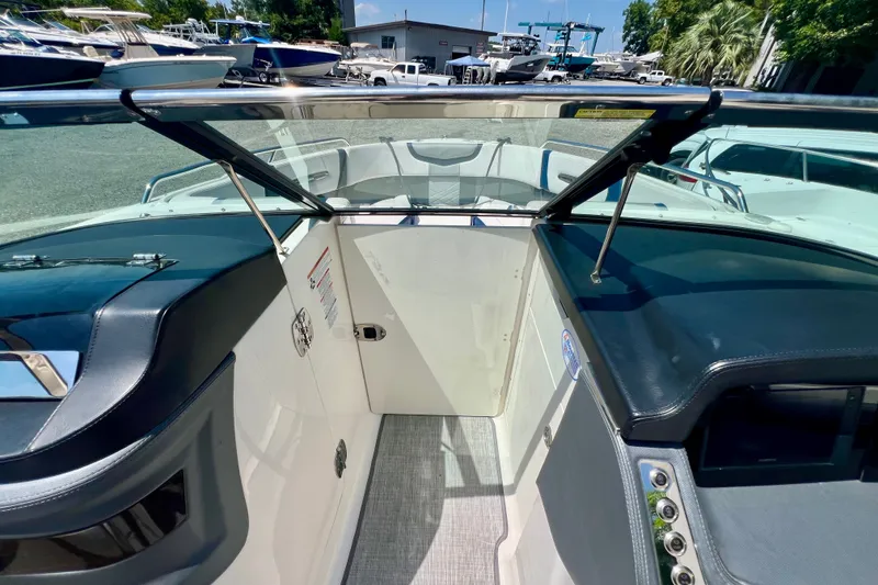 Slide: The Image of 2020 Chaparral 277 SSX boat interior with sleek design and modern dashboard. - 22