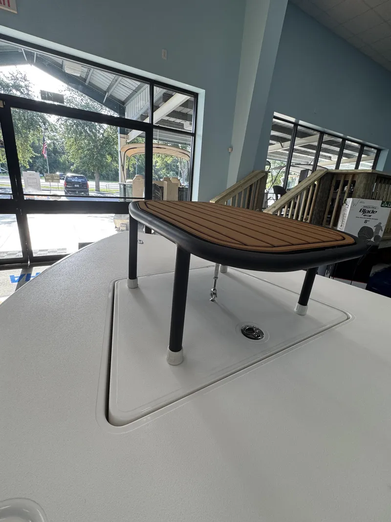 Slide: The Image of A 2027 Maverick 18 HPX-V featuring an elevated wooden deck inside. - 32