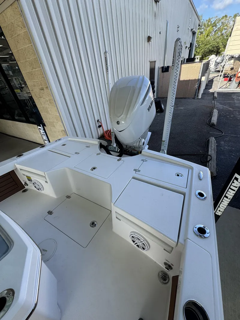 Slide: The Image of The image shows the stern of a 2027 Pathfinder 2500 Tournament boat with an outboard motor. - 42