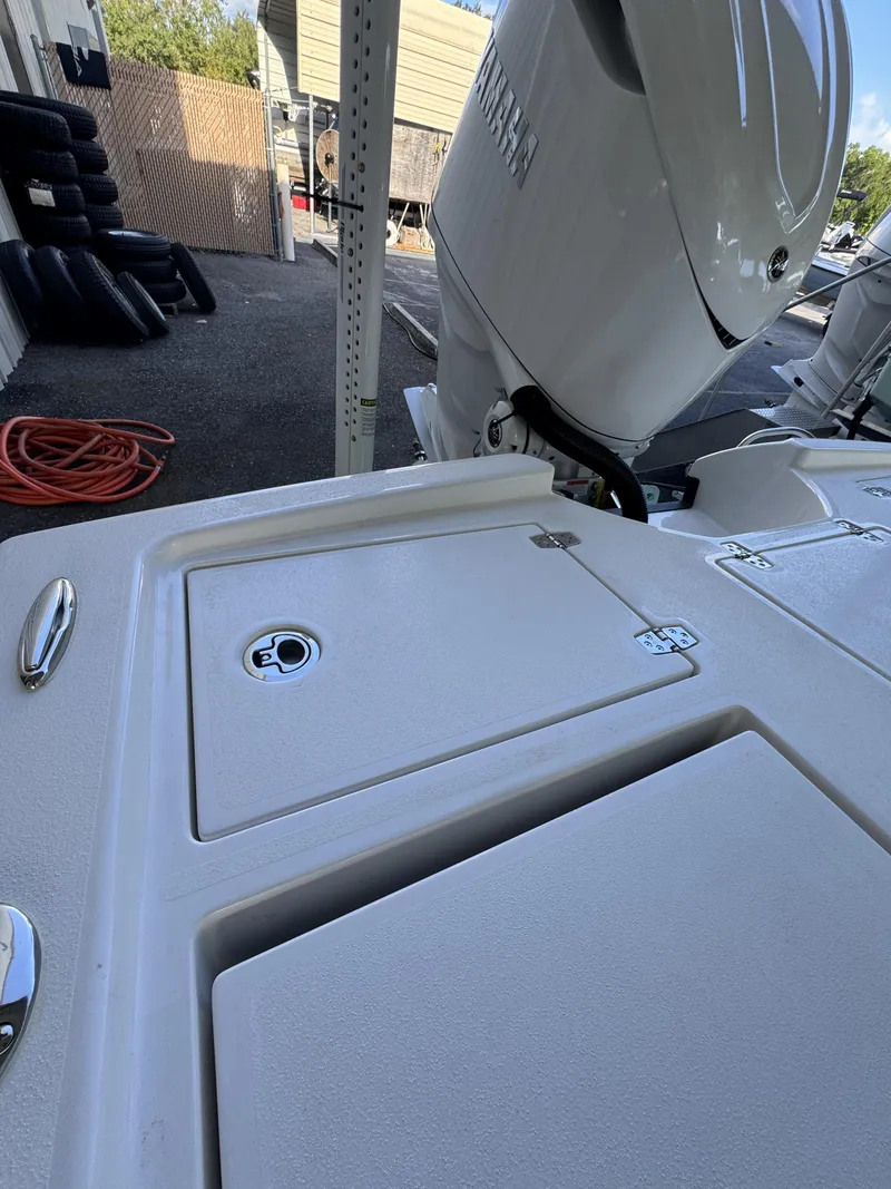 Slide: The Image of The image shows the deck of a Pathfinder 2500 Tournament boat with an outboard motor. - 46