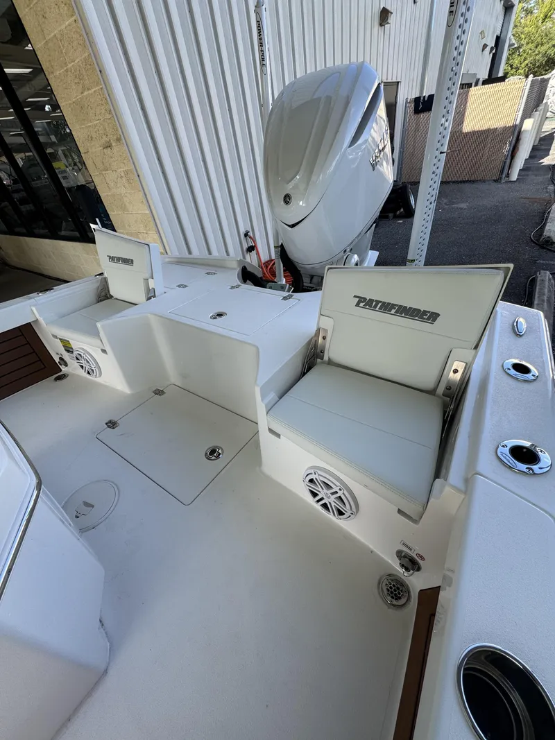 Slide: The Image of The image shows the stern of a 2027 Pathfinder 2500 Tournament boat with an outboard motor. - 45