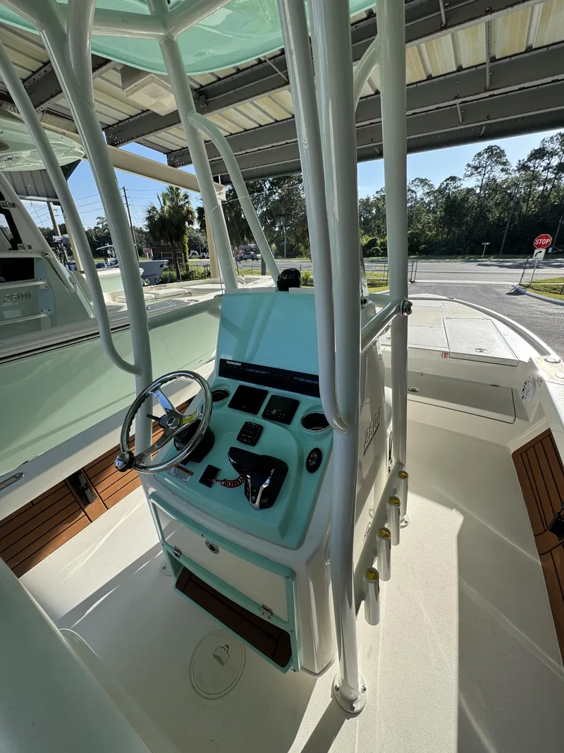 Slide: The Image of The image shows the helm of a 2027 Pathfinder 2500 Tournament boat. - 37